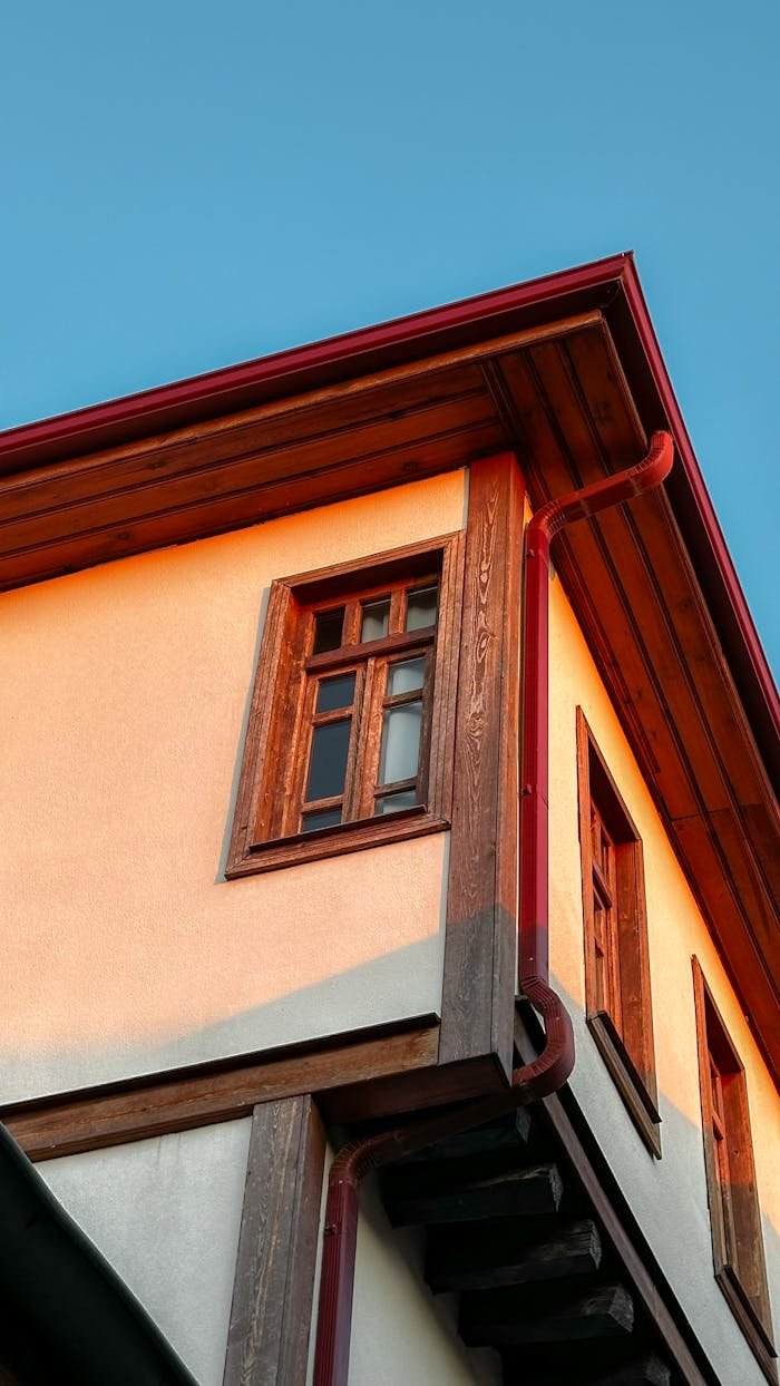 Services A traditional house in Hamamönü, Ankara, showcasing wooden details and sunset lighting.